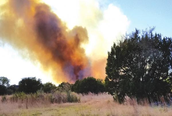 Wimberley fire contained: 60-80 acres burned, school saved, no homes damaged, no lives lost