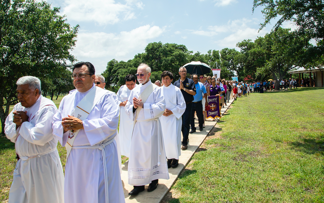 St. Martin de Porres deacons participate in he procession